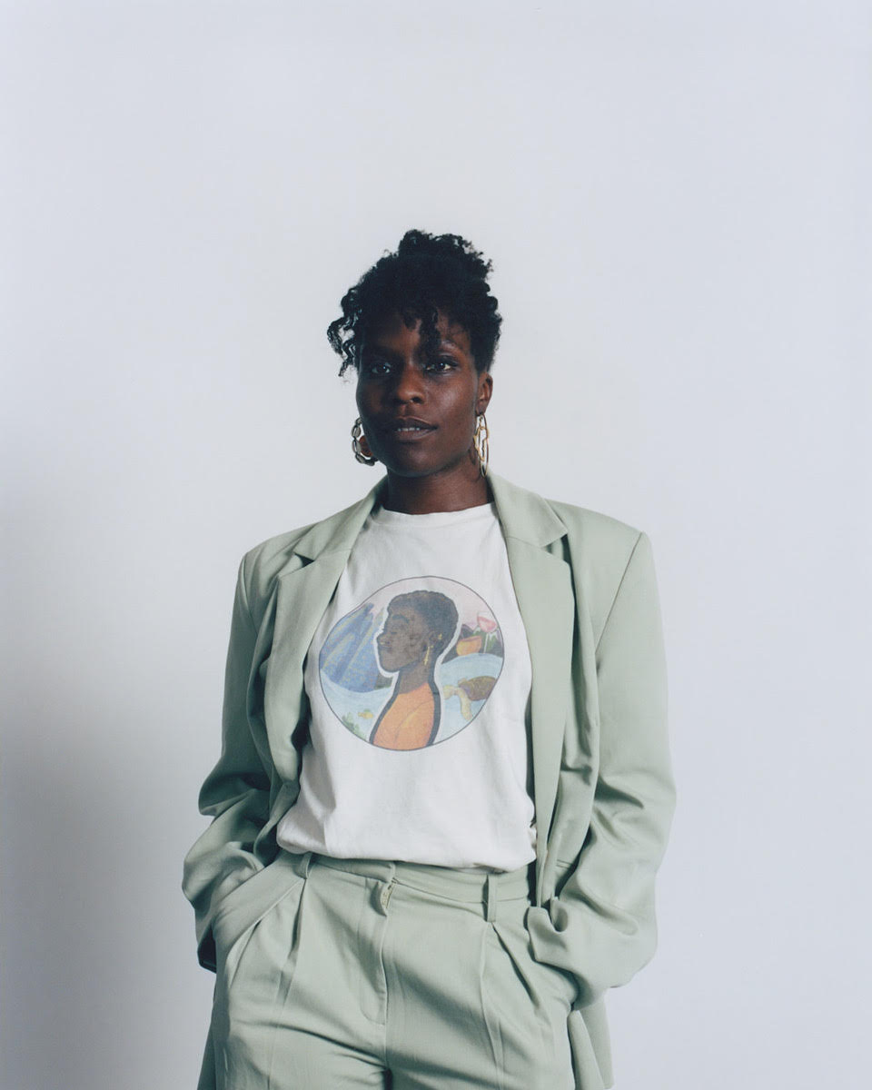 A portrait of Valerie Uchechukwu Ebuwa, wearing a pastel suit and a t-shirt