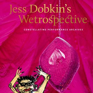 A pink mirrored diamond shape hangs from a tent of pink fabric. Bottom left is an illustration of Jess Dobkin, long hairs extend from raised hands, pointy hair and thick glasses are drawn in graphic black lines.